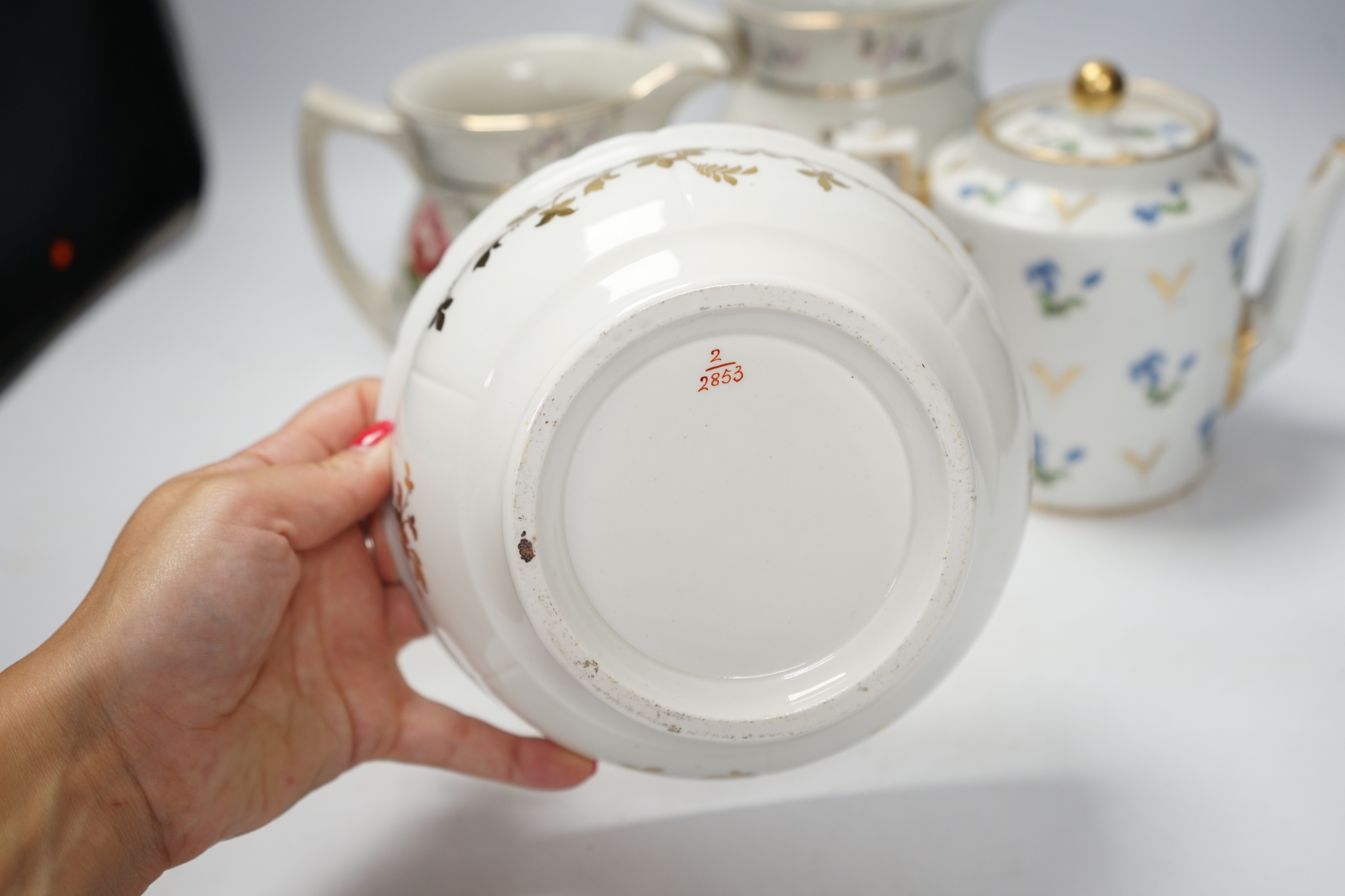 A group of assorted Victorian ceramics including pair of Winton jugs and blue and white wash basin, largest 46cm in diameter